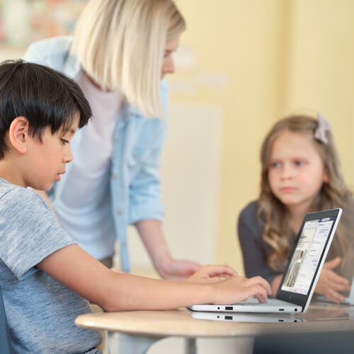 Two elementary age children with their teacher, feeling uncomfortable 