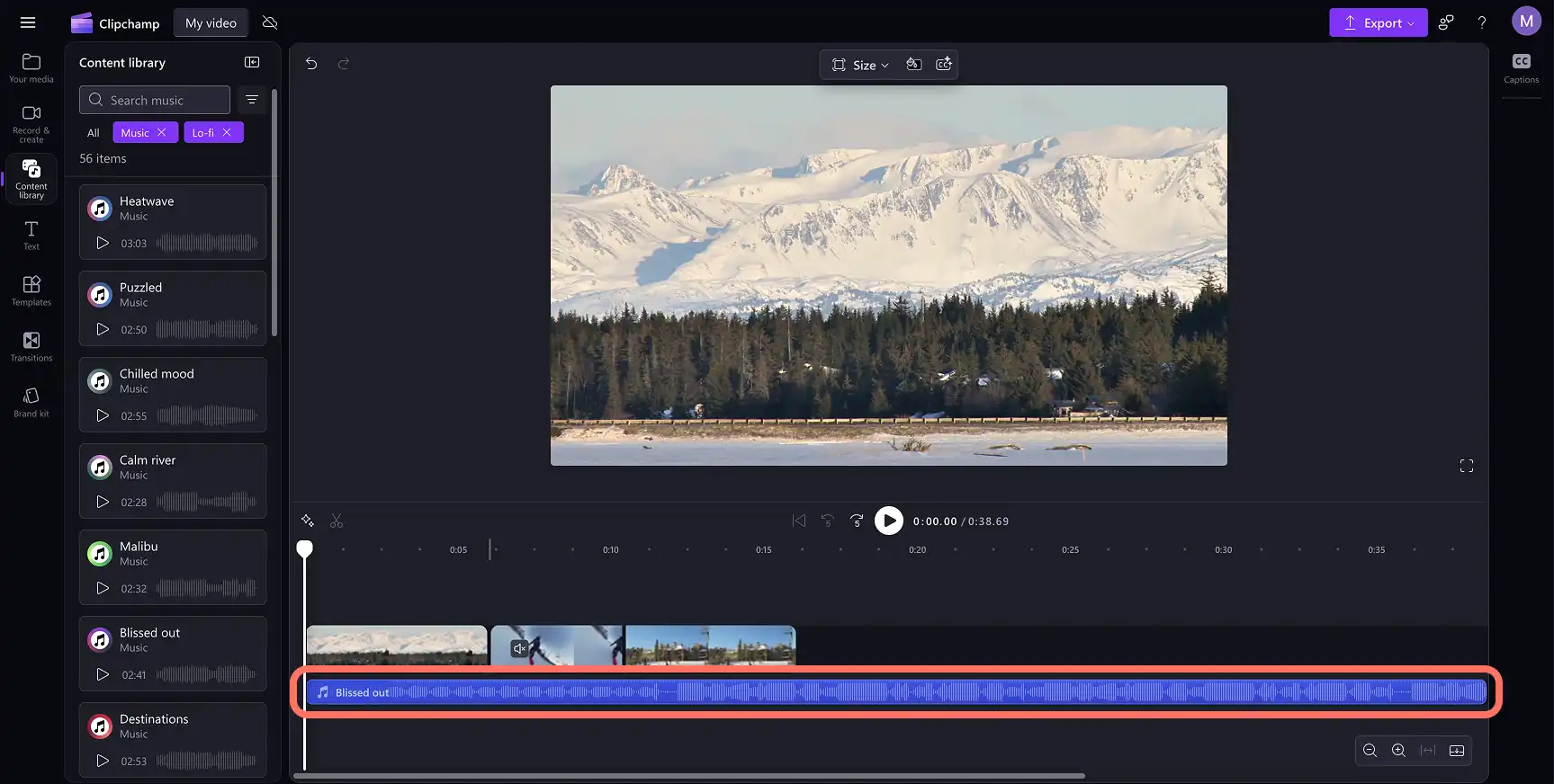 A user dragging and dropping a royalty-free audio song onto the timeline in Clipchamp.