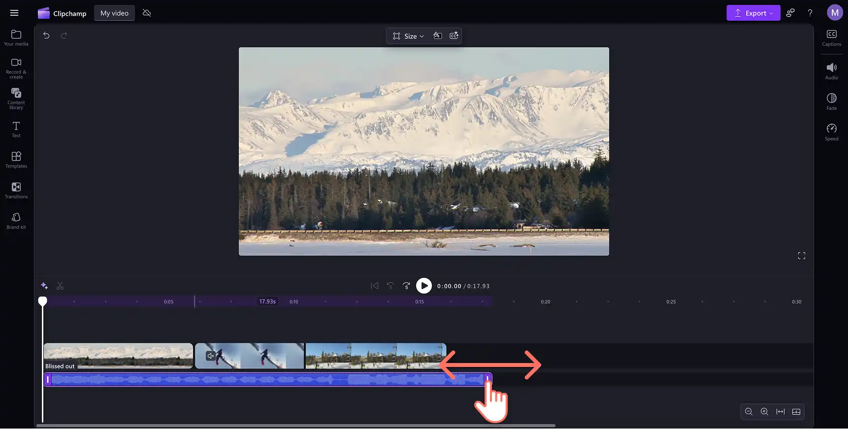 A user trimming a royalty-free music audio clip in the timeline in Clipchamp.